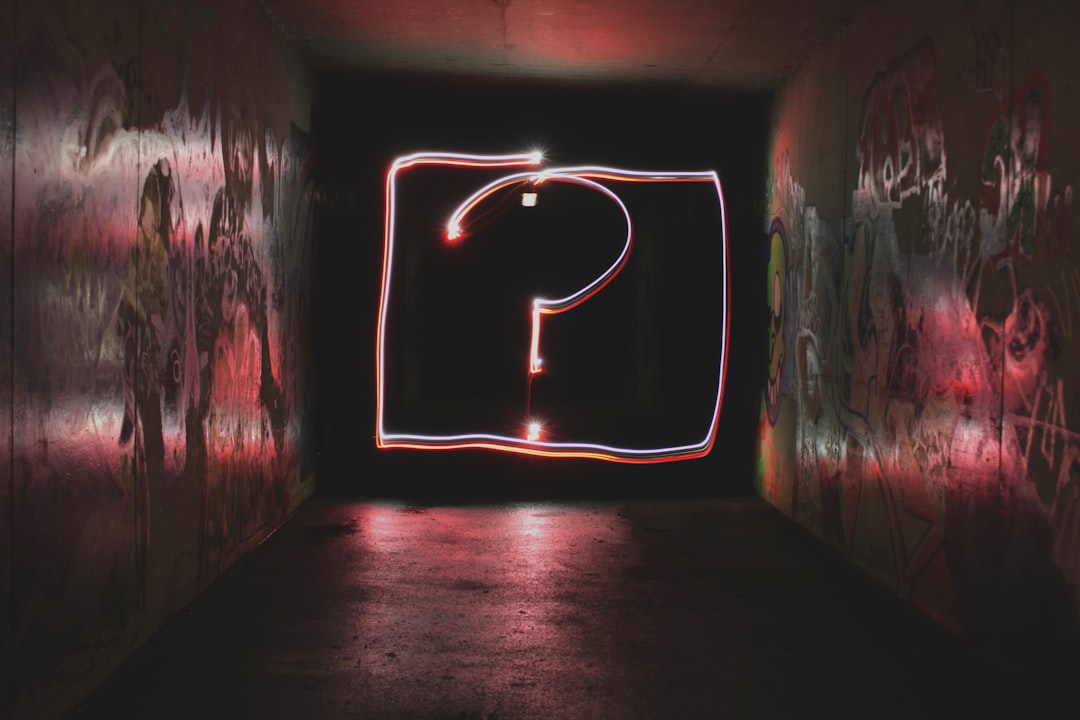 Photo by Emily Morter question mark neon signage
